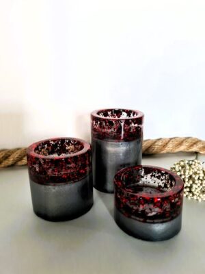 Teelichtform in silber-grau mit roten Flocken